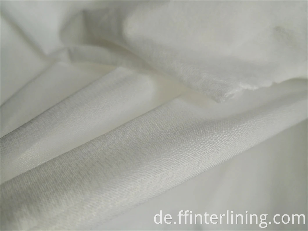 100% Polyester Rundgestrickte PA-Beschichtung Gewebtes Interlining für Denim-Kleidung